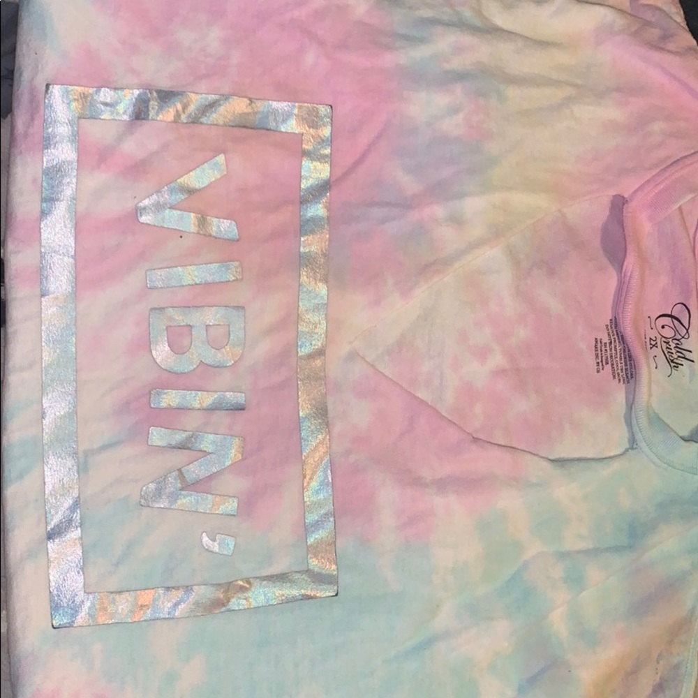 Tie-dye women’s top with cut v neck